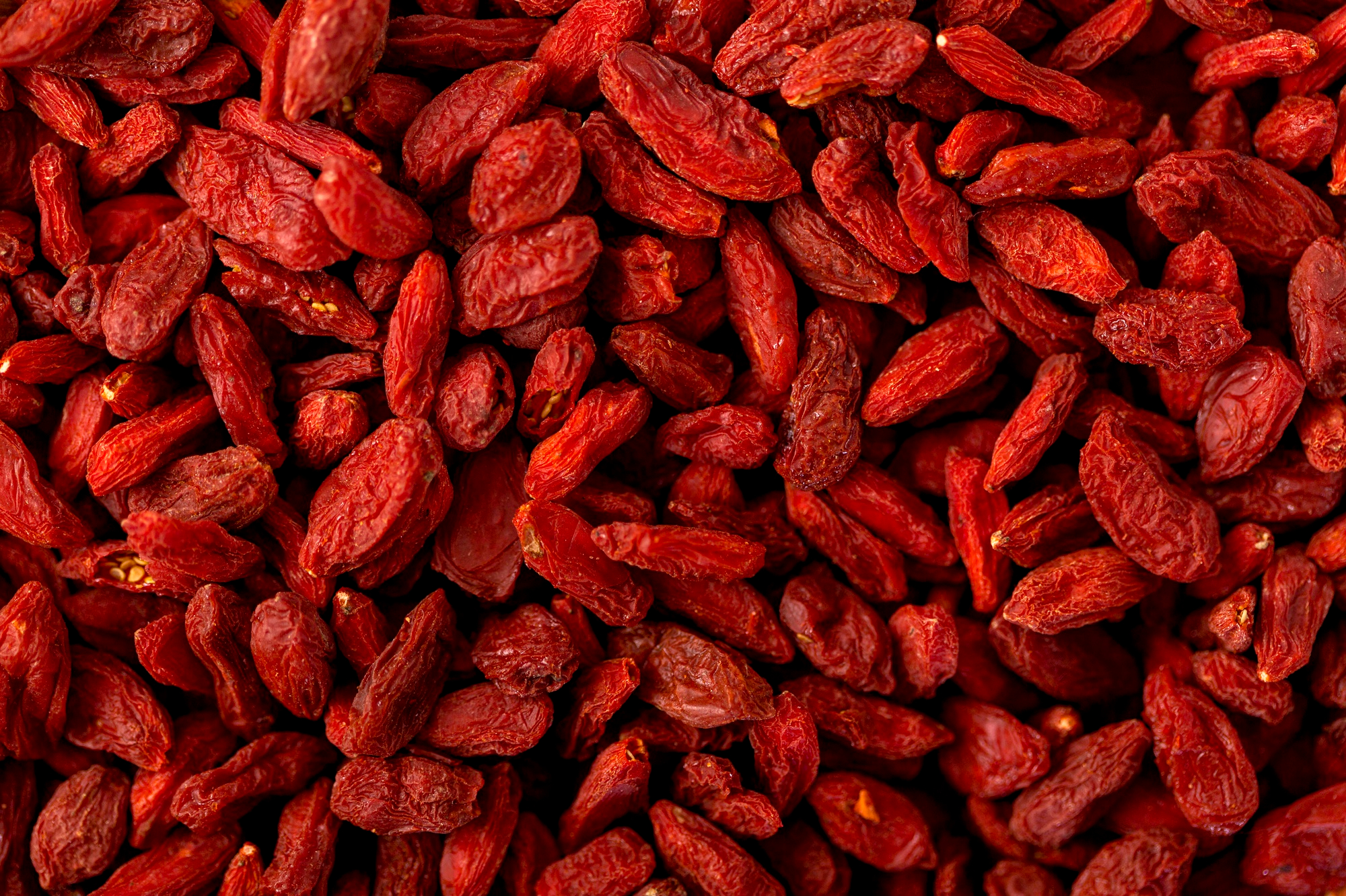 Red raisins with a deep berry color and chewy texture